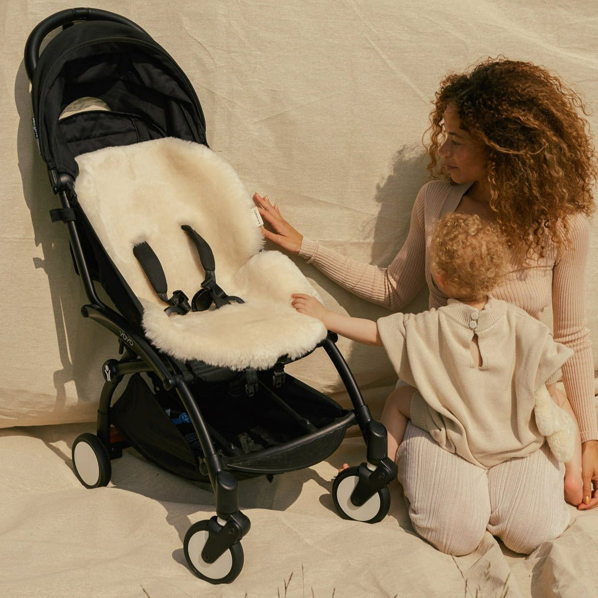 Sheepskin snuggler peanut - Charly's