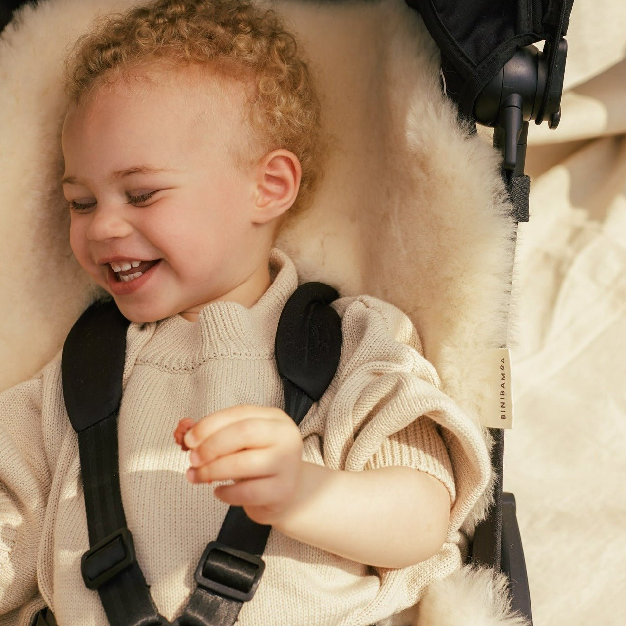 Sheepskin snuggler peanut - Charly's
