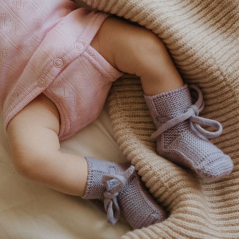 Body rose en maille ajourée
